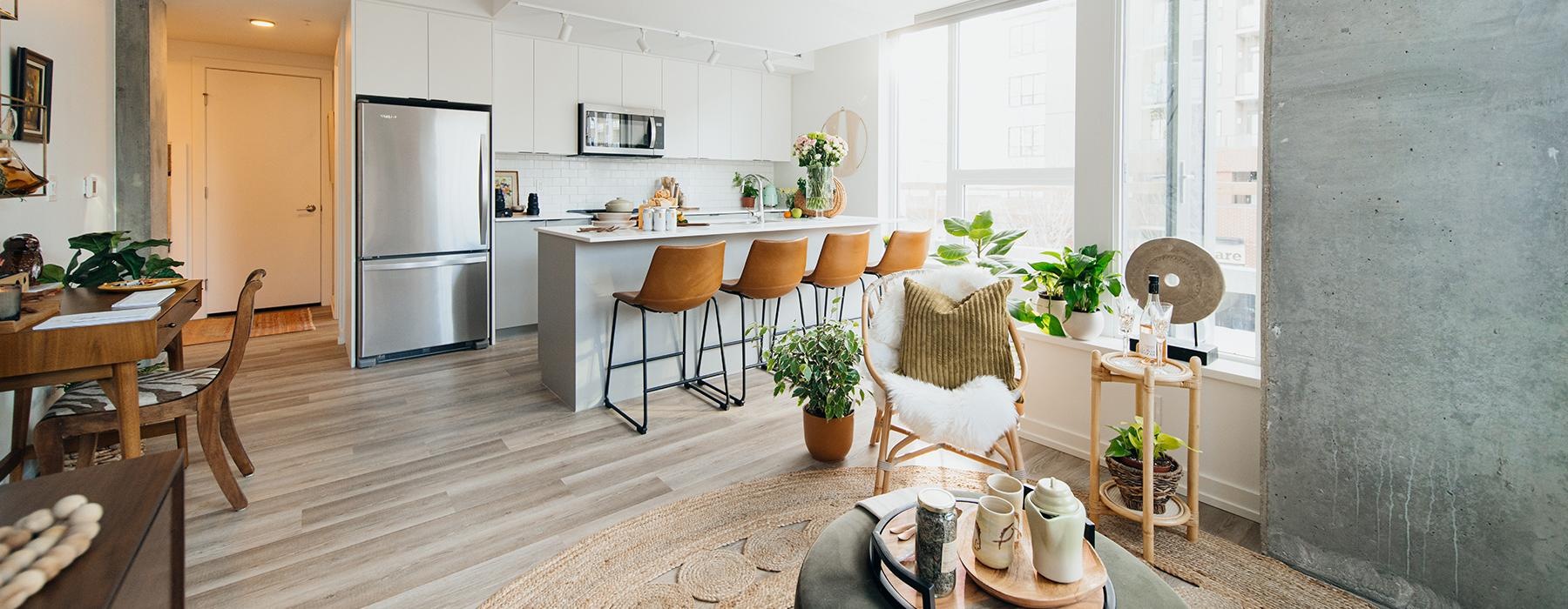 a kitchen with a dining table and chairs