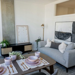 a living room with a tv and couches