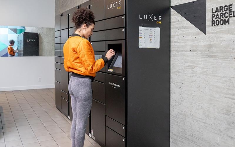 a person standing next to a machine
